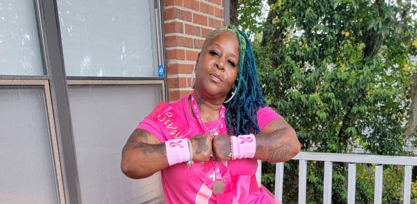 Lisette Davila wears pink as a breast cancer survivor thanking the doctors and staff at the UF Health Proton Therapy Institute