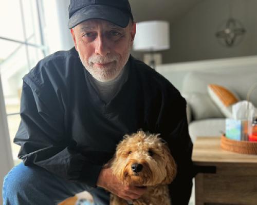 Prostate cancer survivor Tony L and his puppy